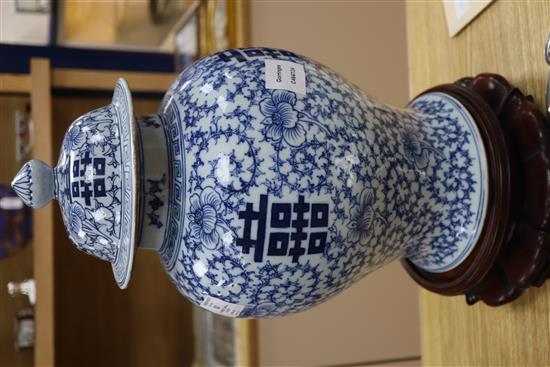 A Chinese blue and white shuangxi jar and cover, wood stand height excl. stand 40cm